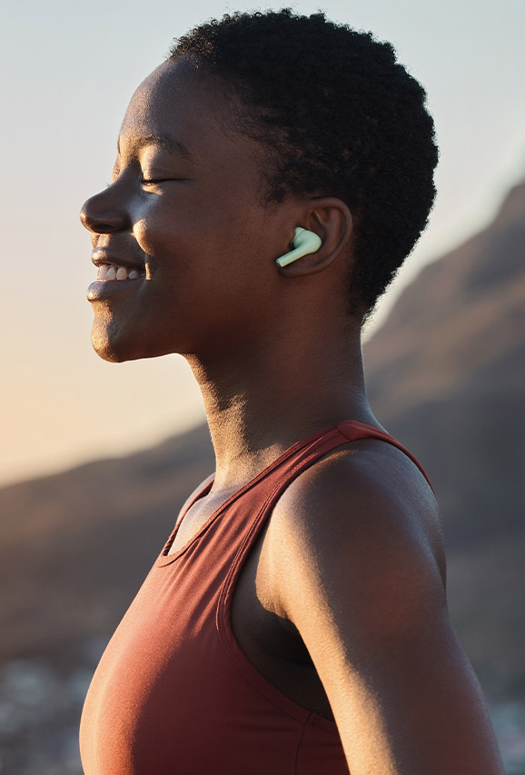 Photo of a smiling woman at peace after women's health treatments